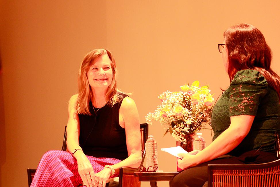 Jennifer Egan, seated, smiles at event facilitator Rachel Luria, also seated